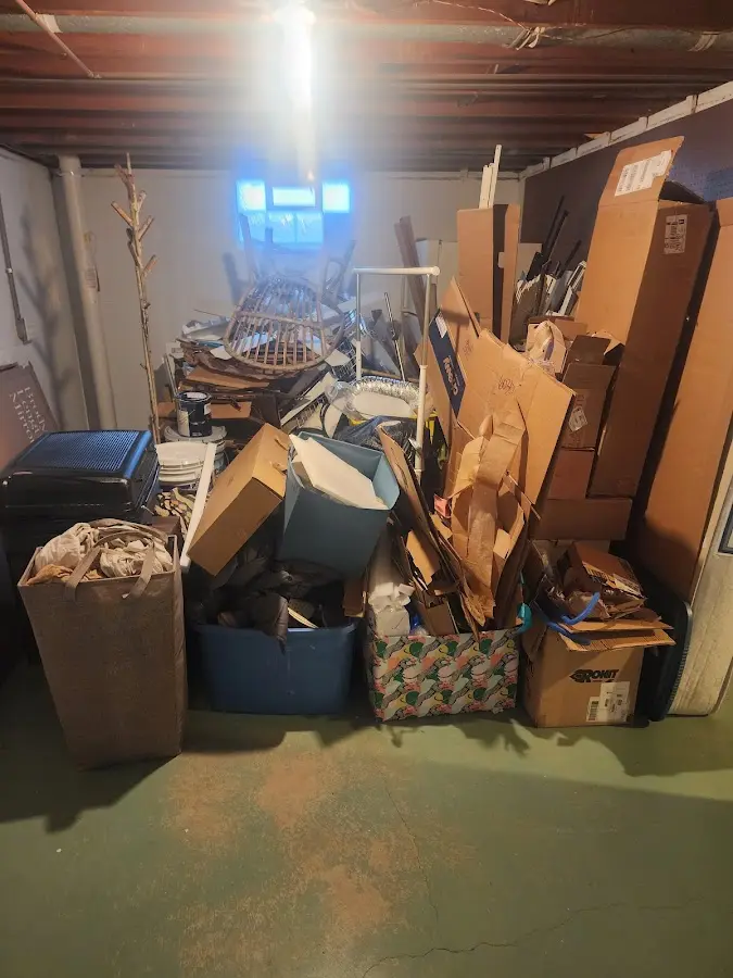 Roll-off dumpster container at job site for 15 Yard Dumpster Rental in River Oaks